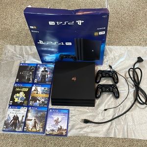 PS4 with 7 games and 2 controllers.